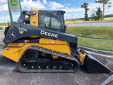 John <strong>Deere</strong> demonstrates the electric quick coupler on its E Series skid steers and how being able to open the door with the attachment raised speeds exchanges. . Deere 333g forestry package